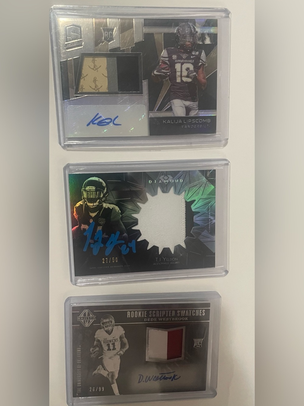 3 patch, autographed, & numbered football cards